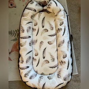 Boppy nursing pillow and baby lounger both with removable covers